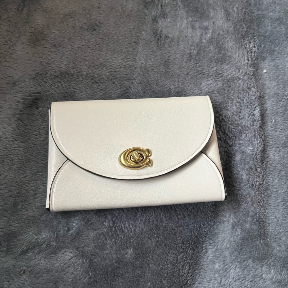 Coach turn lock card holder
